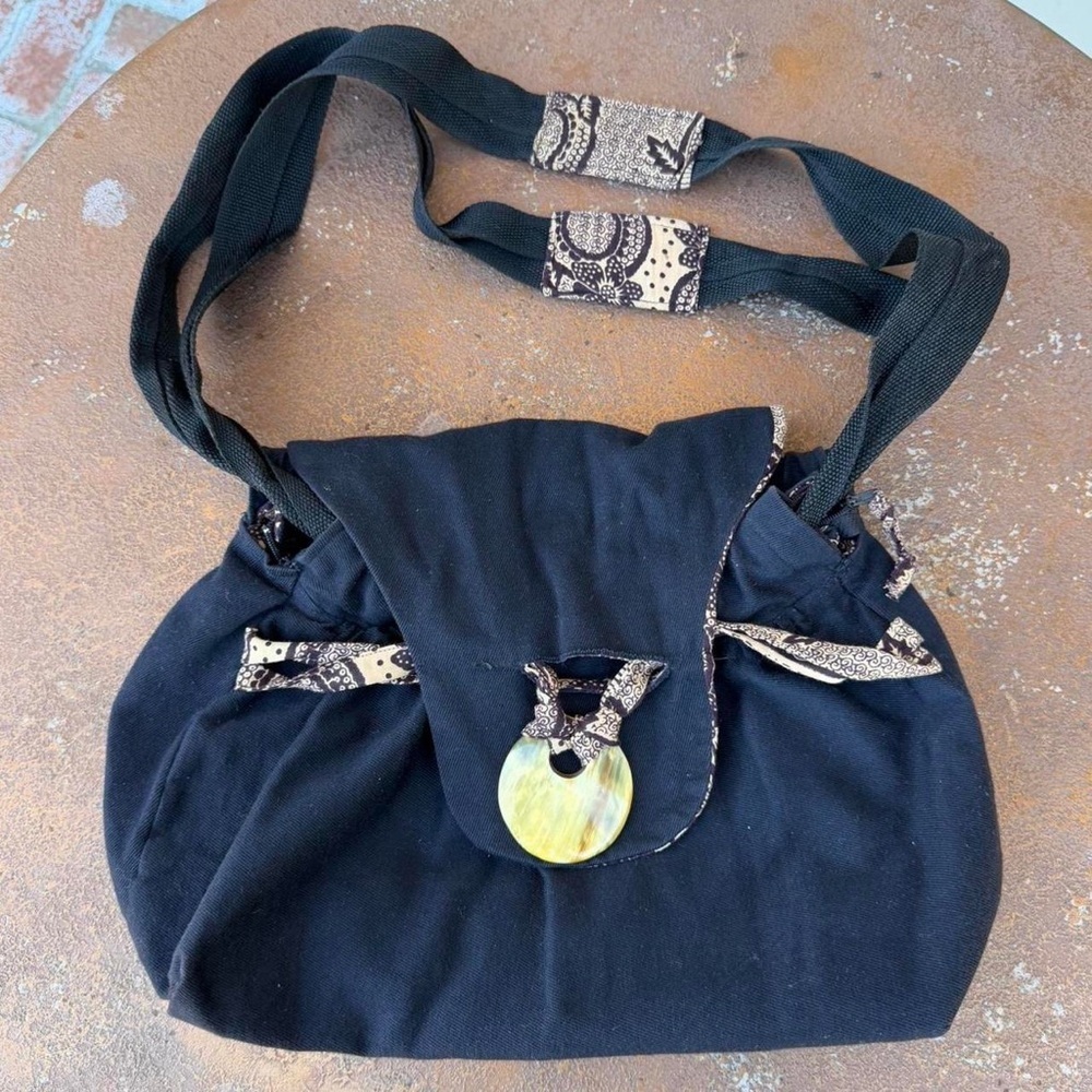 Handmade artisan black boho shoulder bag with large from button